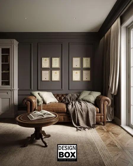 Stylowe wnętrze salonu z brązową sofą, szarymi ścianami i eleganckim stolikiem