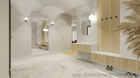 Przedpokój z drewnianymi meblami i lustrem w nowoczesnym stylu.