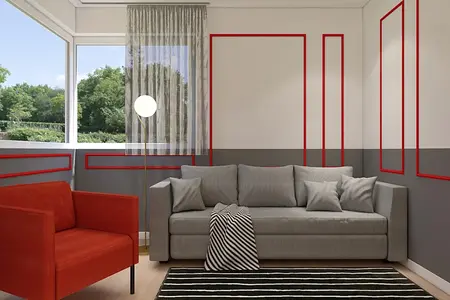 Wnętrze pokoju dziennego z szarym narożnikiem, czerwonym fotelem i nowoczesnym oświetleniem