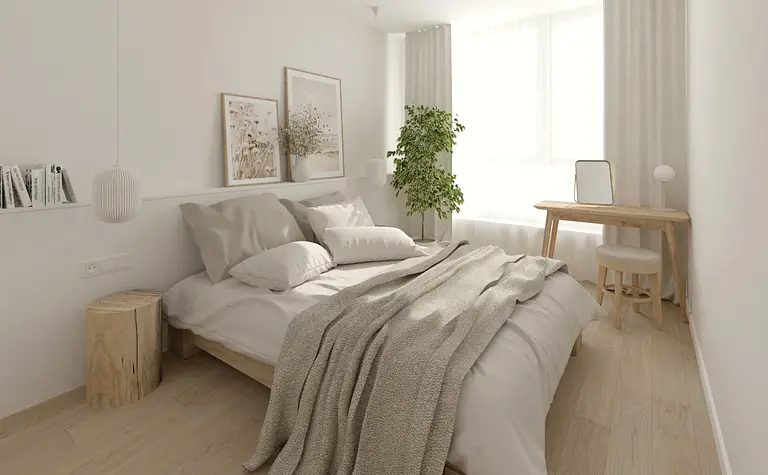 Sypialnia w stylu boho i soft minimalizm z drewnianym łóżkiem i rośliną