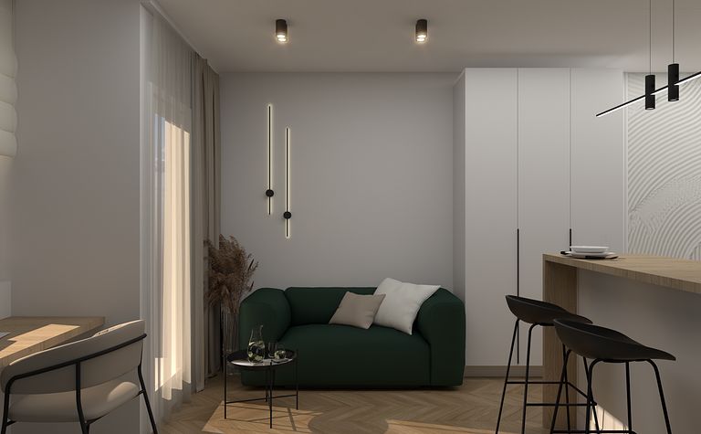 Wnętrze salonu z zieloną sofą, minimalistycznymi akcentami i nowoczesnym oświetleniem.