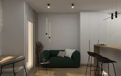 Wnętrze salonu z zieloną sofą, minimalistycznymi akcentami i nowoczesnym oświetleniem.