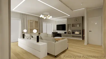 Wnętrze salonu z szarymi meblami, białą sofą i kominkiem.