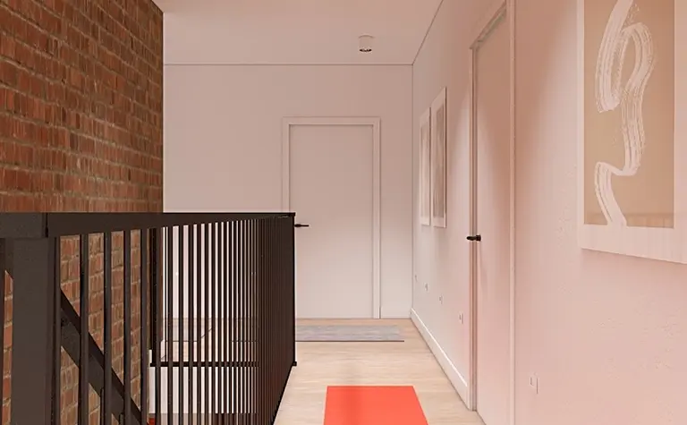 Przedpokój w stylu minimalistycznym z ceglaną ścianą, nowoczesnymi lampami i kolorowymi dywanami.