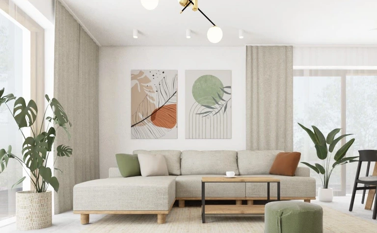 Wnętrze salonu w stylu boho i rustykalnym z jasną sofą i roślinami.