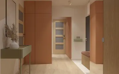 Przedpokój z pomarańczowymi szafami, zielonymi detalami i stylowym wystrojem dopamine decor.
