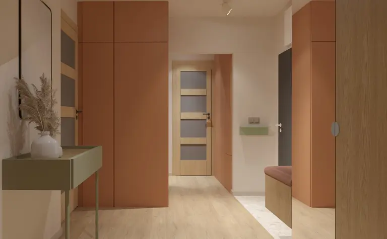 Przedpokój z pomarańczowymi szafami, zielonymi detalami i stylowym wystrojem dopamine decor.