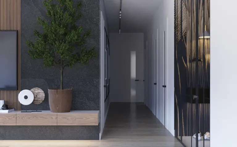 Przedpokój w stylu nowoczesnym z drewnianą podłogą i zieloną rośliną