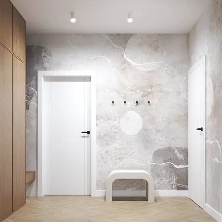 Przedpokój w stylu industrialnym i skandynawskim z beżowymi meblami i minimalistycznymi detalami.