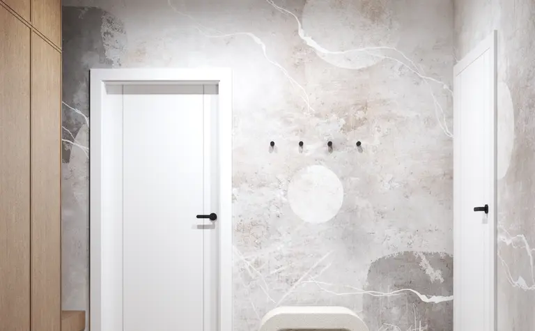 Przedpokój w stylu industrialnym i skandynawskim z beżowymi meblami i minimalistycznymi detalami.