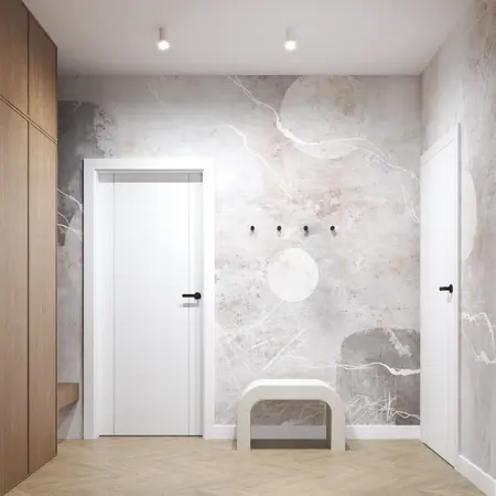 Przedpokój w stylu industrialnym i skandynawskim z beżowymi meblami i minimalistycznymi detalami.