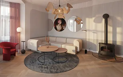 Wnętrze salonu z białą sofą, czerwonym fotelem i dekoracją dopamine decor.