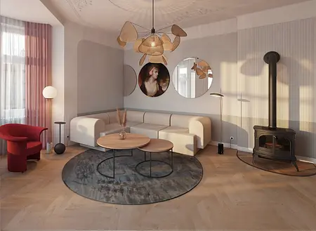 Wnętrze salonu z białą sofą, czerwonym fotelem i dekoracją dopamine decor.