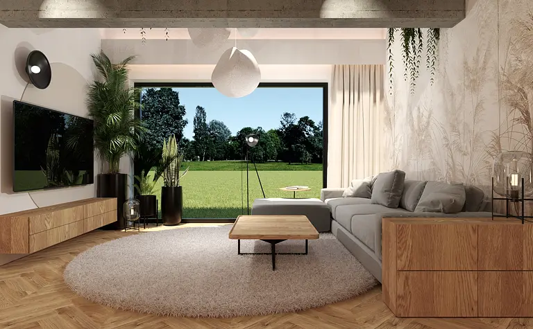 Współczesny salon z szarym narożnikiem i drewnianymi meblami, roślinność w tle.