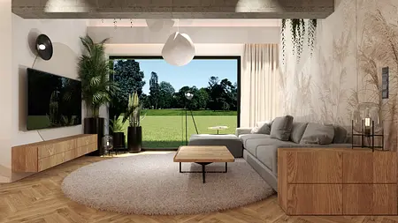 Współczesny salon z szarym narożnikiem i drewnianymi meblami, roślinność w tle.