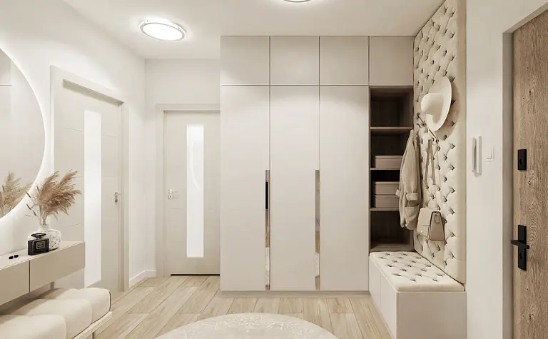 Przedpokój z jasnymi meblami, drewnianą podłogą, w stylu glamour i nowoczesnym.
