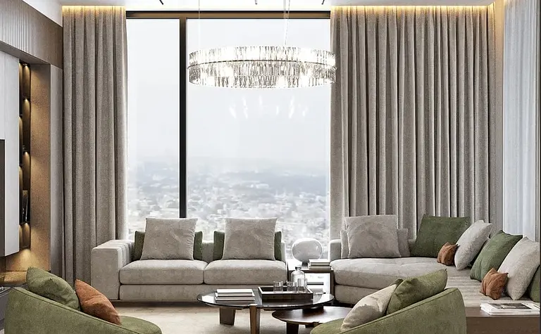 Wnętrze salonu w stylu glamour i minimalistycznym z zielonymi meblami.