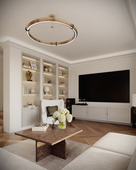 Wnętrze salonu w stylu quiet luxury z białymi meblami i brązowym stolikiem.