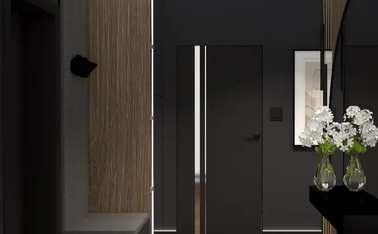 Przedpokój w stylu industrialnym z drewnianą podłogą i nowoczesnymi detalami.