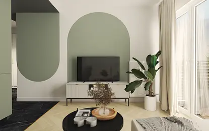 Wnętrze salonu w stylu boho z roślinami i minimalistycznym wystrojem.