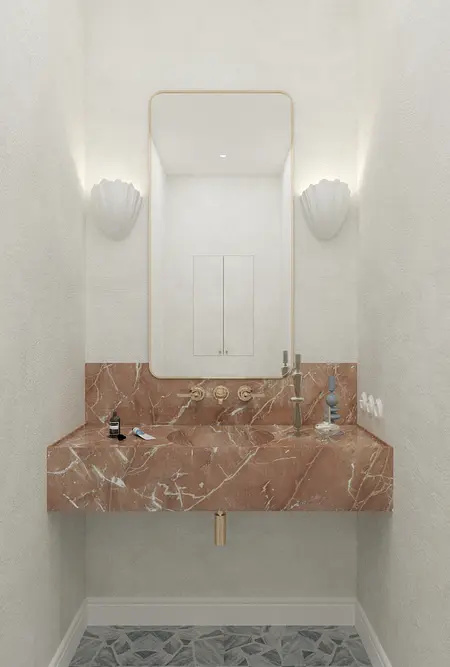 Wnętrze łazienki z marmurową umywalką, lustrem i elementami art deco, minimaluxe, quiet luxury.