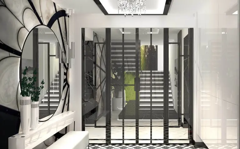 Przedpokój w stylu art deco i glamour z czarną podłogą i dużym lustrem.