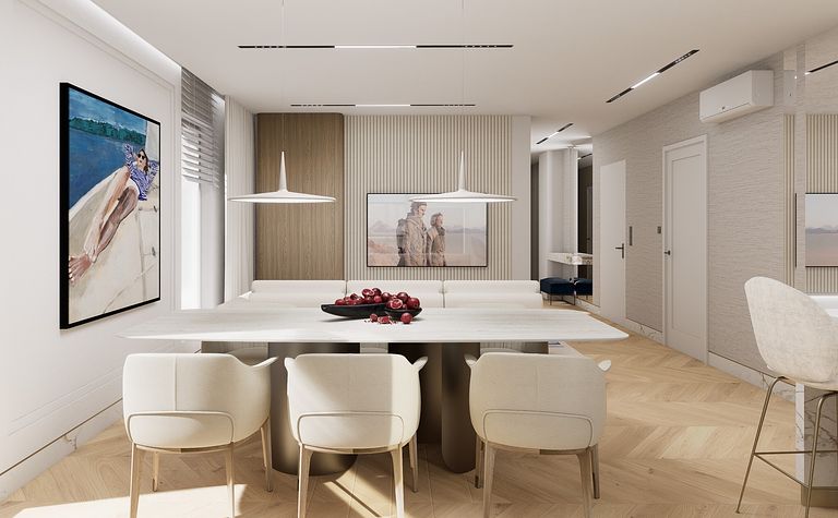 Wnętrze jadalni w stylu minimaluxe z jasnym stołem i krzesłami.