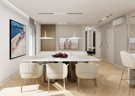 Wnętrze jadalni w stylu minimaluxe z jasnym stołem i krzesłami.