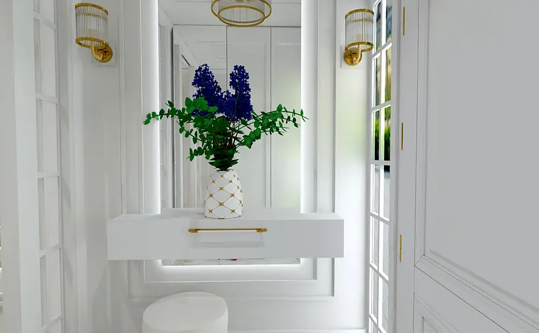 Przedpokój z białą konsolą, złotymi lampami i kwiatami w wazonie. Styl glamour i współczesny.