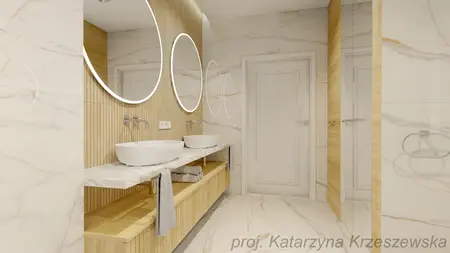 Wnętrze nowoczesnej łazienki z białymi umywalkami i drewnianymi elementami