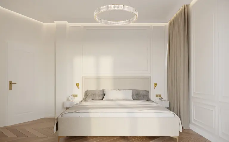 Sypialnia w stylu quiet luxury z białym łóżkiem i drewnianą podłogą.