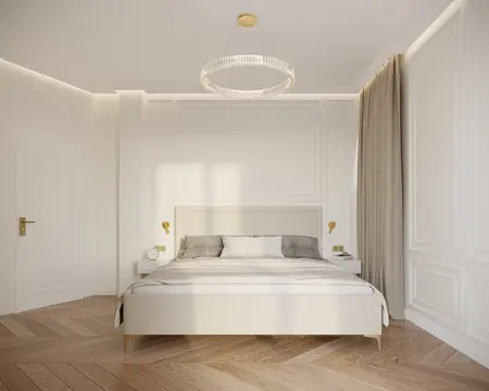 Sypialnia w stylu quiet luxury z białym łóżkiem i drewnianą podłogą.