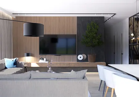 Wnętrze nowoczesnego salonu z drewnianą ścianą, telewizorem i rośliną.