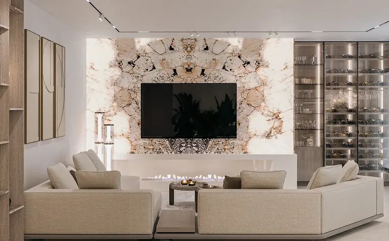 Wnętrze nowoczesnego salonu z jasnymi meblami i kamienną ścianą w stylu quiet luxury.