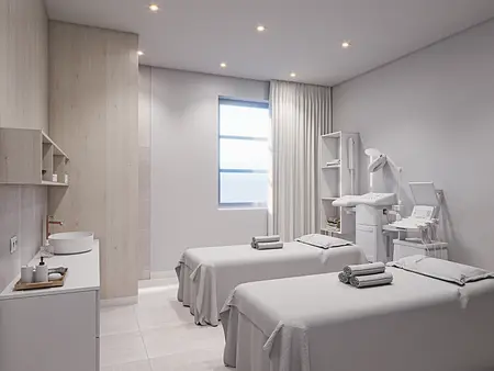 Wnętrze gabinetu z białymi meblami, drewnianymi detalami, minimalistyczne i nowoczesne.