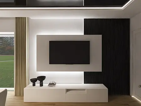 Nowoczesne wnętrze salonu z minimalistycznym designem, białymi meblami i czarnymi akcentami.