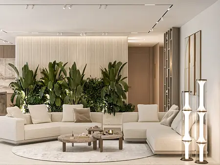 Wnętrze nowoczesnego salonu z roślinnymi akcentami, jasnymi meblami i współczesnym stylem.