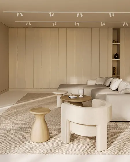 Minimalistyczny salon w stylu soft minimalizm z jasnymi meblami.