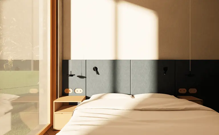 Wnętrze sypialni w stylu japandi i minimalistycznym z dużymi oknami