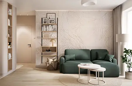 Wnętrze salonu boho-japandi-minimalistycznego z zieloną sofą i drewnianymi elementami.