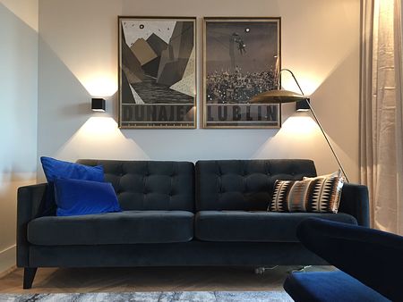 Czarna kuchnia w mieszkaniu inwestycyjnym by wedodesign.pl