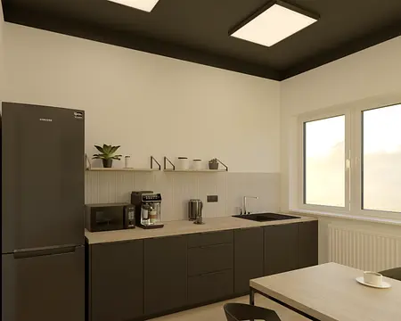 Kuchnia w stylu industrialnym z czarnymi meblami i drewnianym blatem.