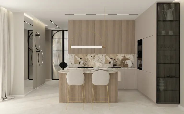 Wnętrze kuchni z nowoczesnymi elementami i marmurowym blatem w stylu quiet luxury.