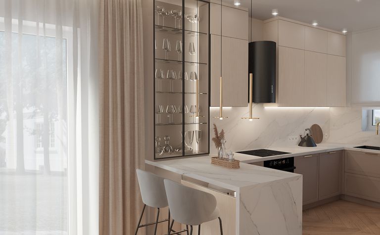 Wnętrze kuchni z beżowymi meblami i marmurowym blatem, styl dopamine decor