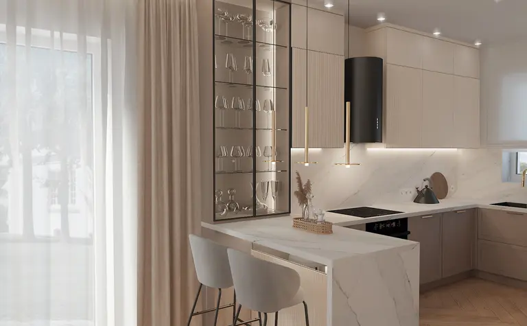 Wnętrze kuchni z beżowymi meblami i marmurowym blatem, styl dopamine decor