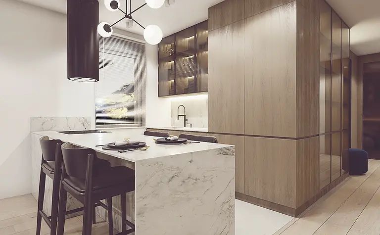 Kuchnia minimalistyczna z marmurowym blatem i drewnianymi meblami, styl quiet luxury.