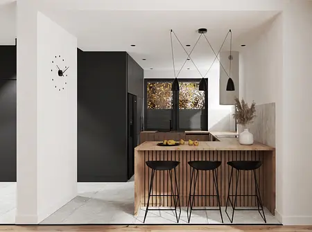 Wnętrze nowoczesnej kuchni z drewnianym blatem, czarnymi lampami i minimalistycznym designem.