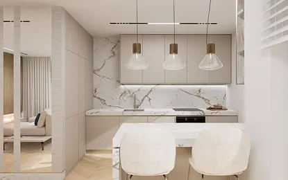 Kuchnia z marmurowym blatem i jasnymi meblami w stylu minimaluxe oraz soft minimalizm.