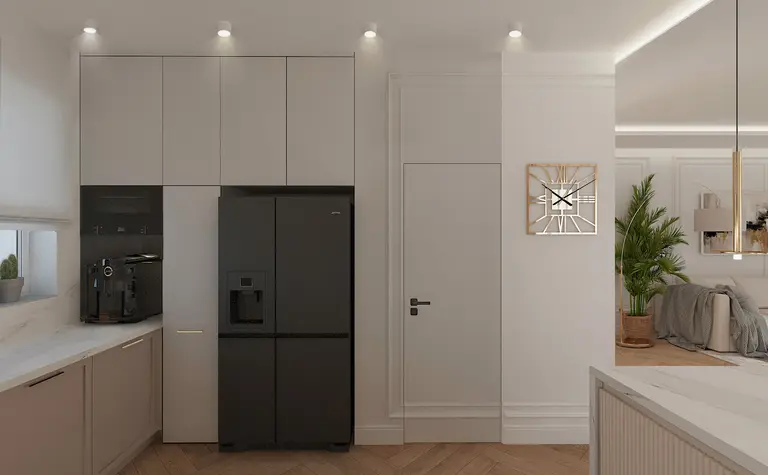 Wnętrze nowoczesnej kuchni z czarną lodówką i jasnymi meblami w stylu dopamine decor.