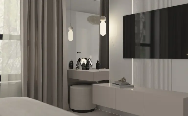 Nowoczesne wnętrze z telewizorem, szafką i dekoracjami w stylu quiet luxury.